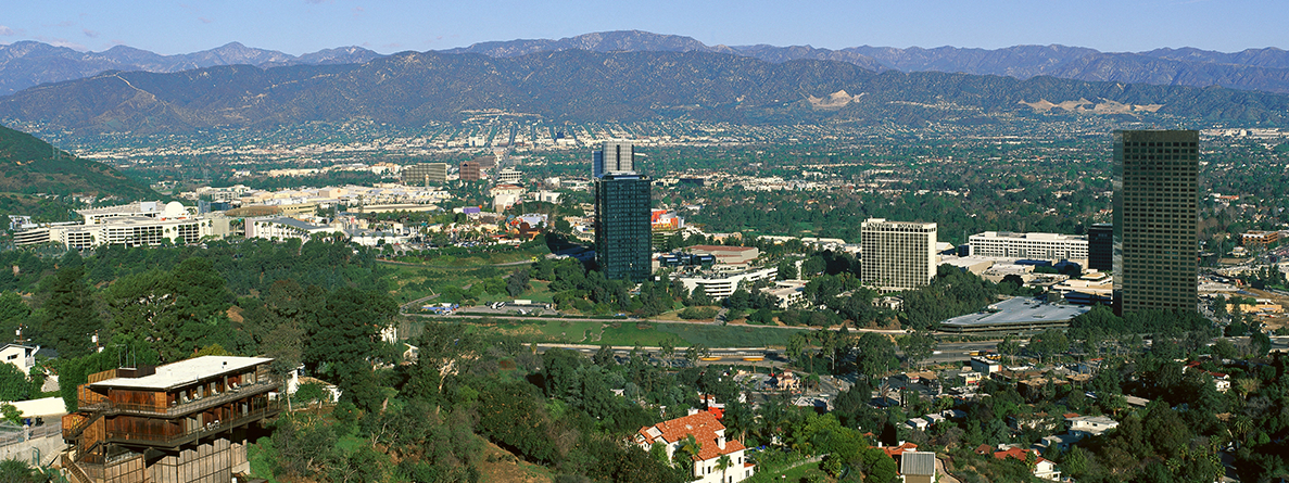  Aerial photo of skyline in the San Fernando Valley with mountains in the background